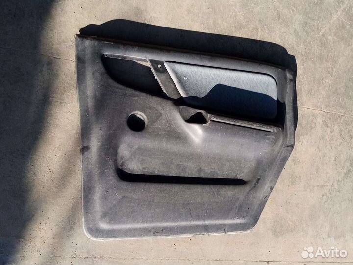 Обшивка двери газ 3110