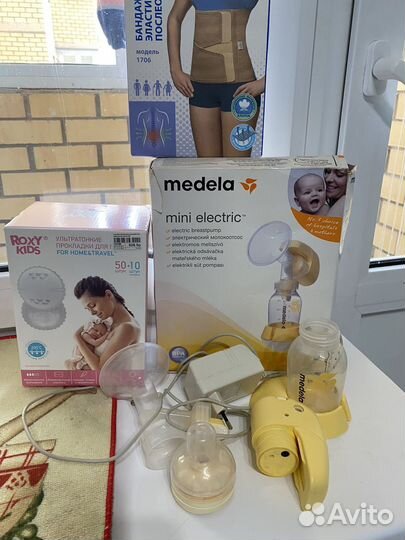 Молокоотсос medela электрический