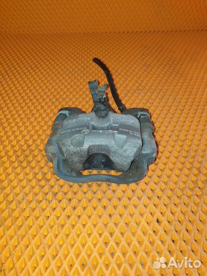 Суппорт тормозной задний правый Mazda 3 BM