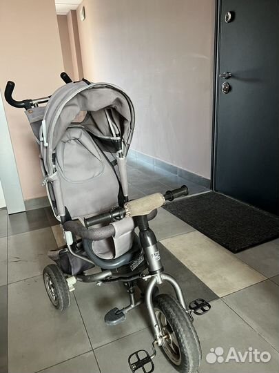 Трехколесный велосипед с ручкой