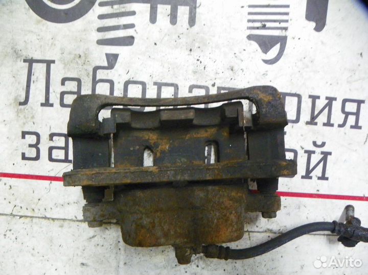 Суппорт тормозной передний левый Kia Sorento