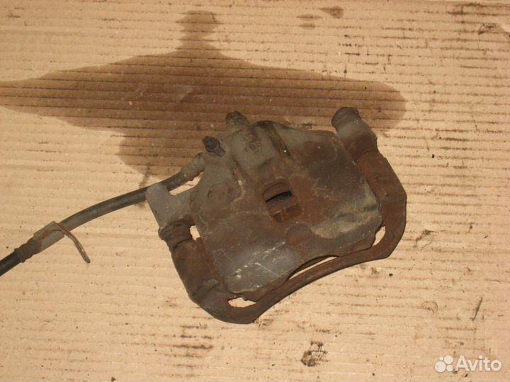 Суппорт тормозной передний правый Hyundai Getz