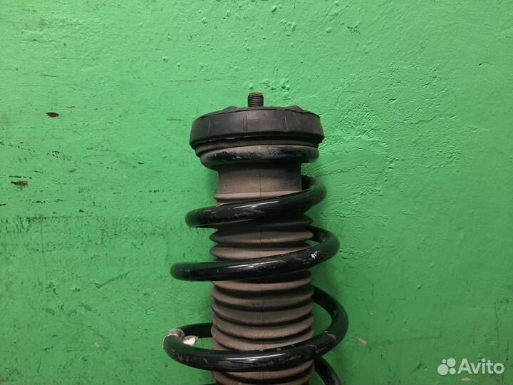 Стойка амортизатора передняя правая Opel Zafira C