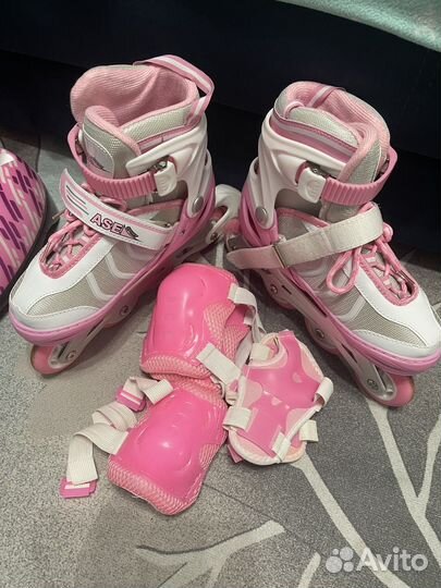 Роликовые коньки