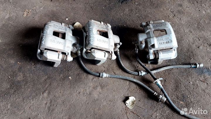 Суппорт тормозной передний. Lacetti. Daewoo Gentra