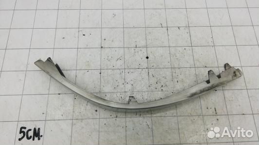 Ус под фару (ресничка) левый BMW 7 E65 (83Z18Q201)