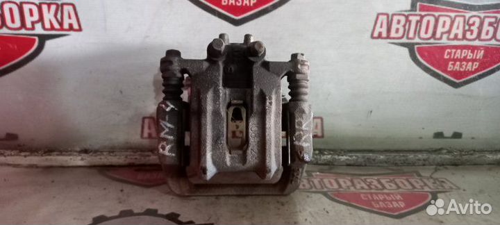 Суппорт тормозной задний правый Honda Cr-V RM4