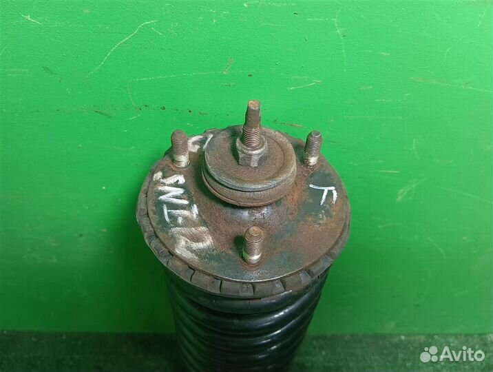 Стойка амортизатора передняя левая Ssangyong Rext