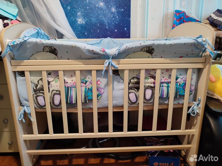 Детская кровать колесо-качалка