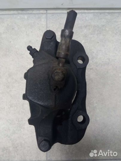 Суппорт тормозной передний правый Volkswagen Polo