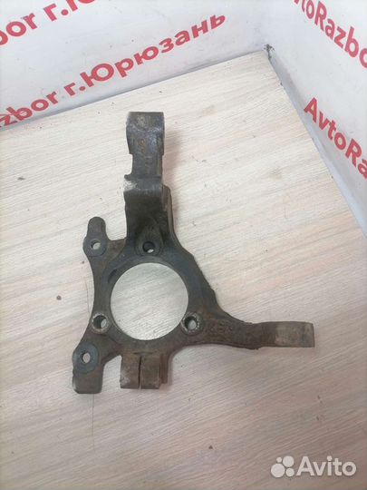 Поворотный кулак правый Opel Astra H