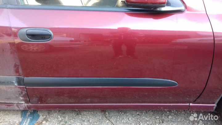 Дверь передняя правая Ниссан Альмера N16