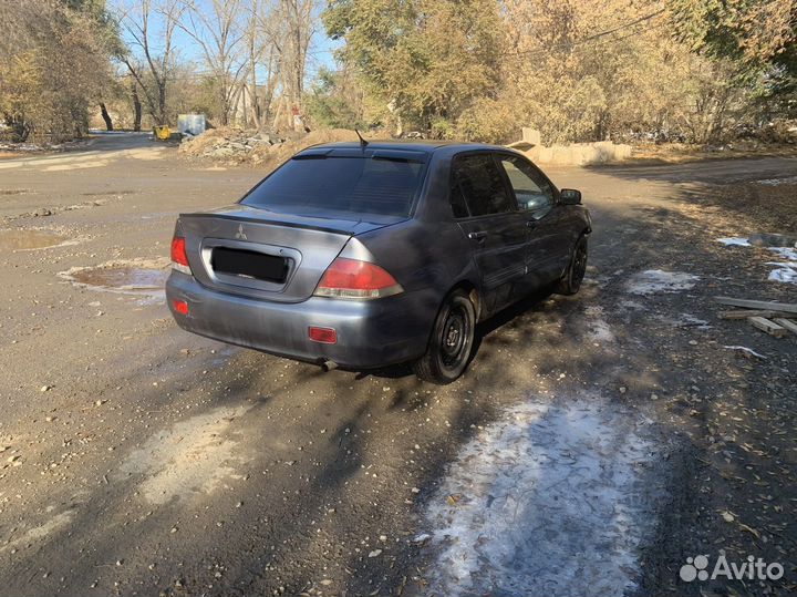 Mitsubishi Lancer 1.6 МТ, 2009, битый, 195 000 км