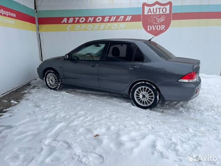 Mitsubishi Lancer 1.6 МТ, 2006, 303 000 км