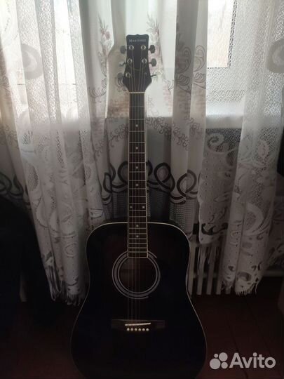 Акустическая гитара