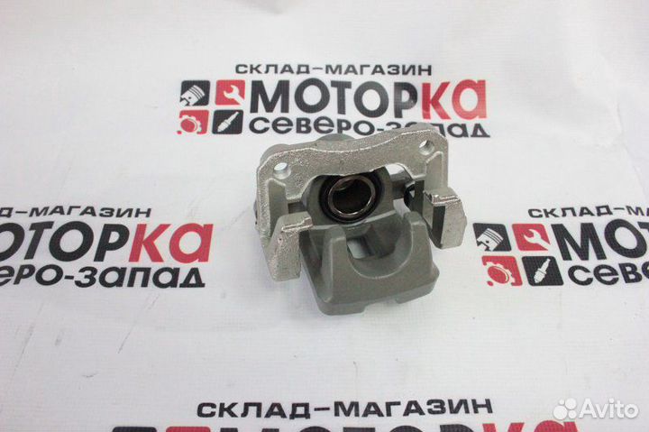 Суппорт тормозной задний левый Toyota Rav4 2azfe