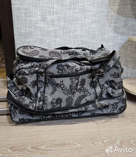 Сумка дорожная на колесах с выдвижной ручкой