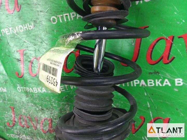 Стойка передняя правая mazda demio