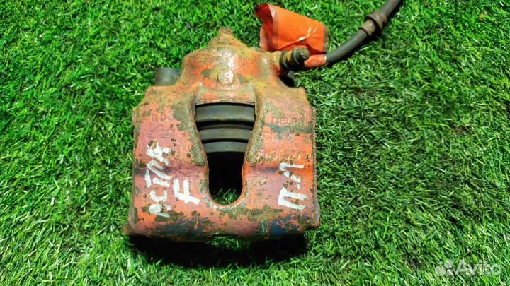 Суппорт тормозной Opel Astra F