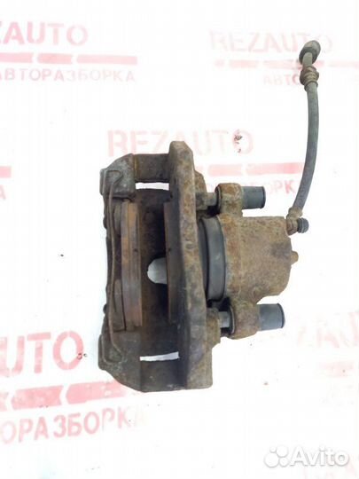 Суппорт тормозной передний левый Mazda Mazda3 BK