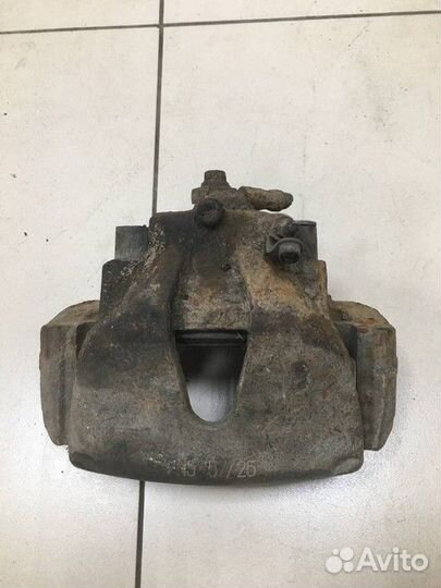 Суппорт передний левый Opel Astra