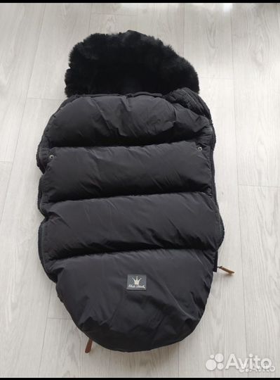 Меховой конверт в коляску санки