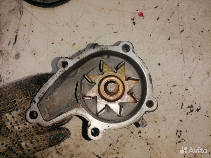 Помпа Nissan CD20 CD20T