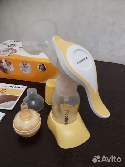 Молокоотсос medela ручной + соска Calma