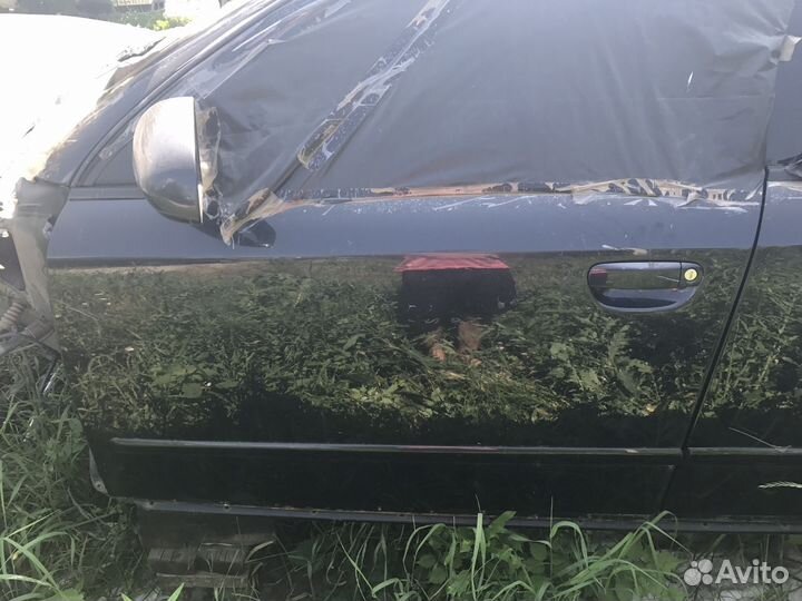 Дверь передняя левая A4