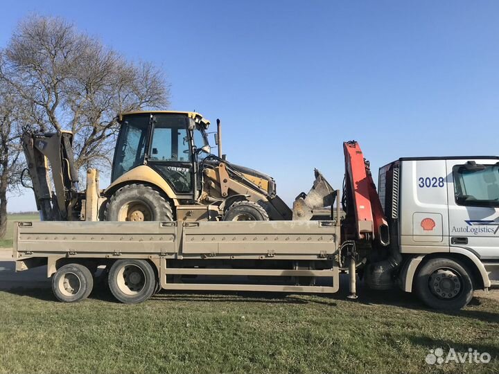 Экскаватор погрузчик в Симферополе с гидромолотом