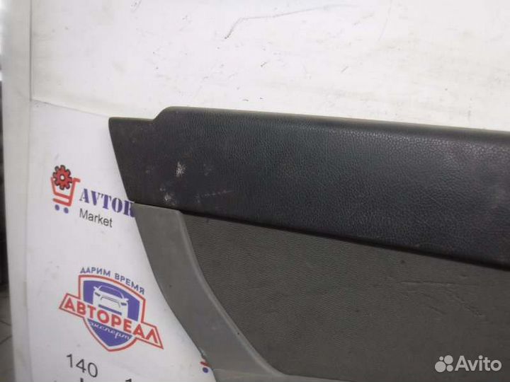 Обшивка двери задняя левая Лада Приора 21126 2011