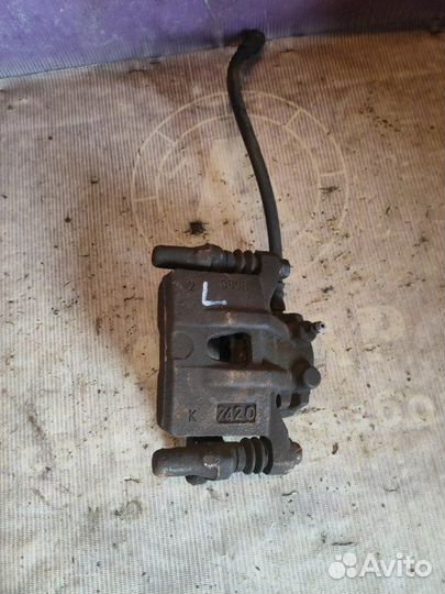 Суппорт тормозной задний левый Peugeot 4007 DW12