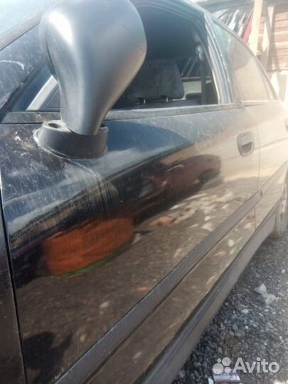 Дверь боковая передняя левая Mitsubishi Carisma