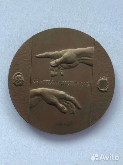 Монета Микеланджело