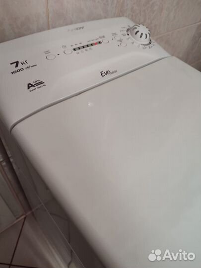 Стиральная машинка с вертикальной загрузкой Candy