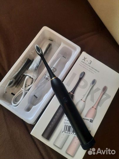 Электронная зубная щетка