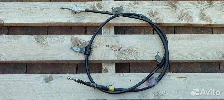 Трос стояночного тормоза Toyota Corolla E15