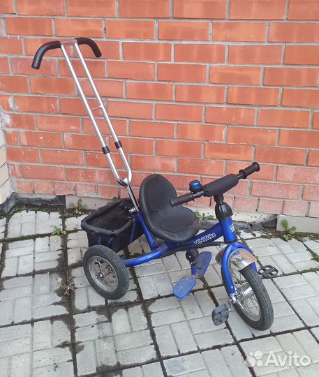 Трехколесный велосипед с ручкой