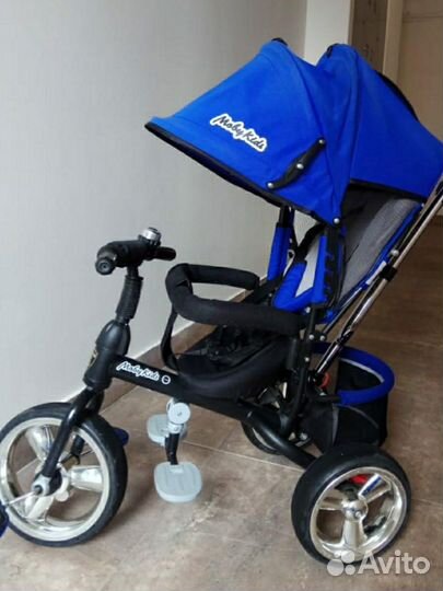 Трехколесный велосипед с ручкой