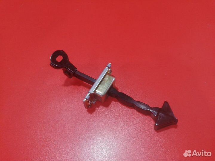 Ограничитель двери передний Mazda Verisa DC5W