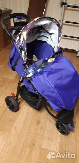 Детская прогулочная коляска babyton