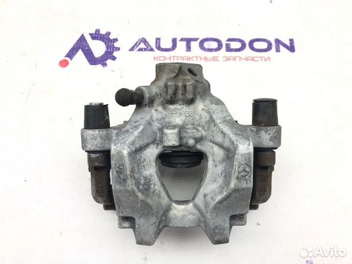 Суппорт тормозной задний левый Mercedes C-Class