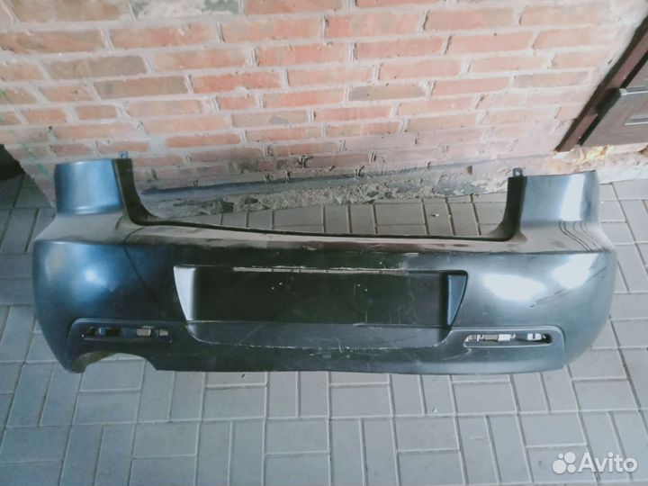 Бампер задний Мазда 3 бк седан