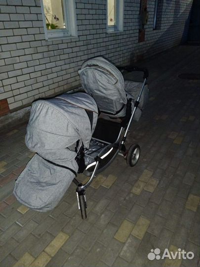 Двойная детская коляска