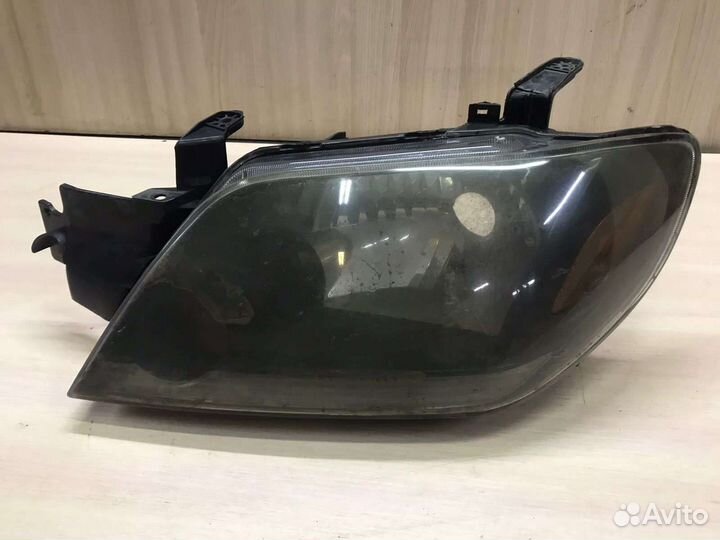 Фара левая mitsubishi outlander 1