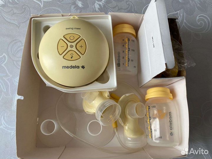 Молокоотсос medela swing flex электрический
