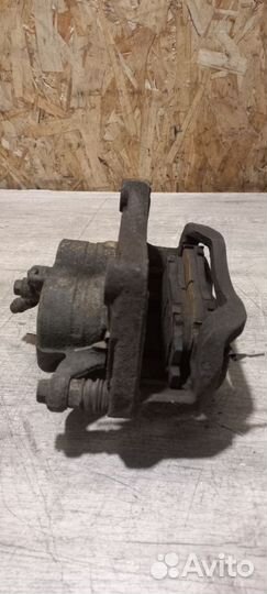 Суппорт передний левый Nissan Pathfinder R51 2.5