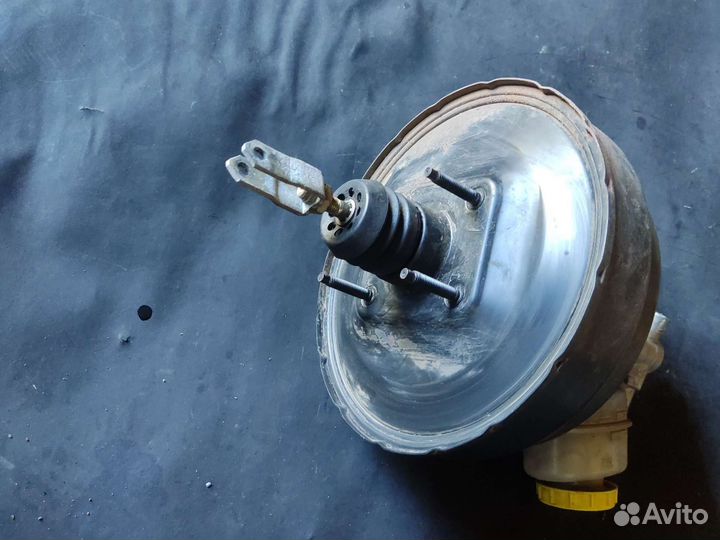 Вакуумник в сборе с гтц Nissan Maxima a32