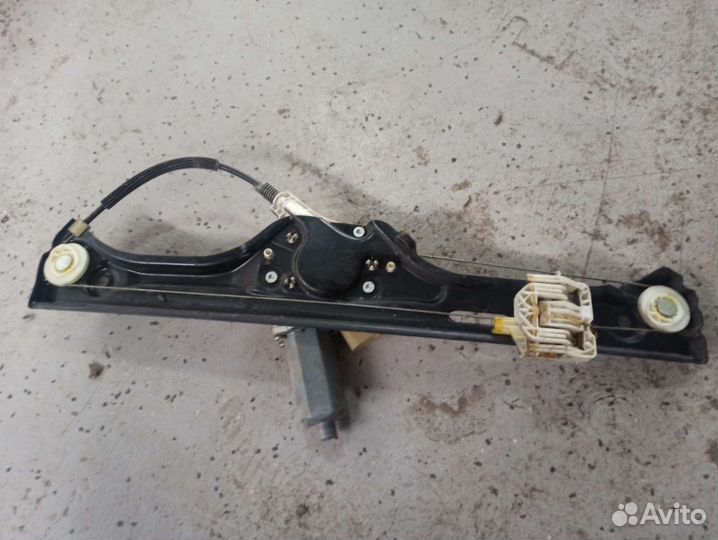 Стеклоподъемник электрический задний левый BMW X5