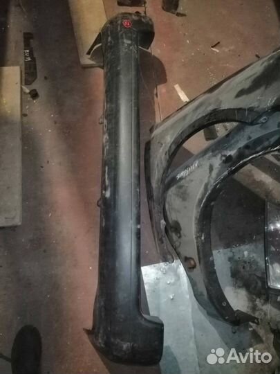 Бампер задний Toyota Corolla AE100